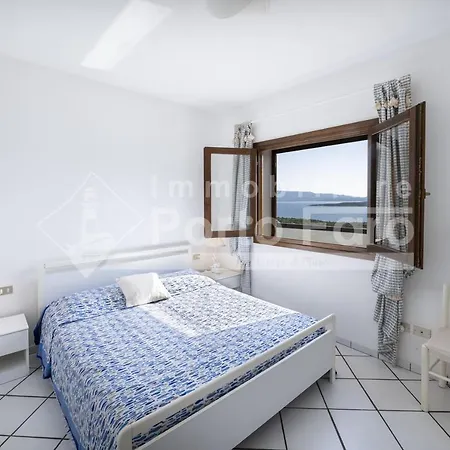 16c - Terrazza Vista Mare Sulla Spiaggia Di Porto Mannu 팔라우